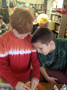 cracking eggs into batter