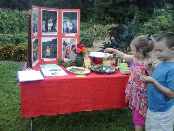 Garden visitors trying a veggie dip.