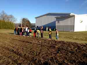 Older classes watch tilling