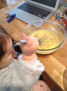 mixing eggs, oil, sugar and bananas