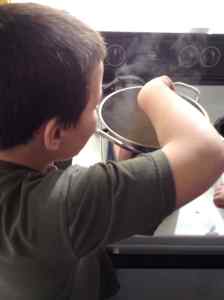 stirring the yeast into the soup