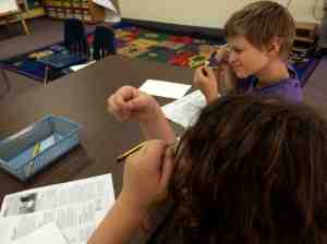 using a magnifying glass