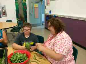 Mother and son canning