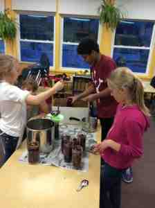 adding brine and storing jars