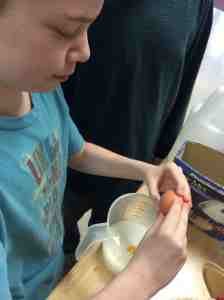 cracking eggs, delicate work