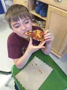 eating homemade pizza