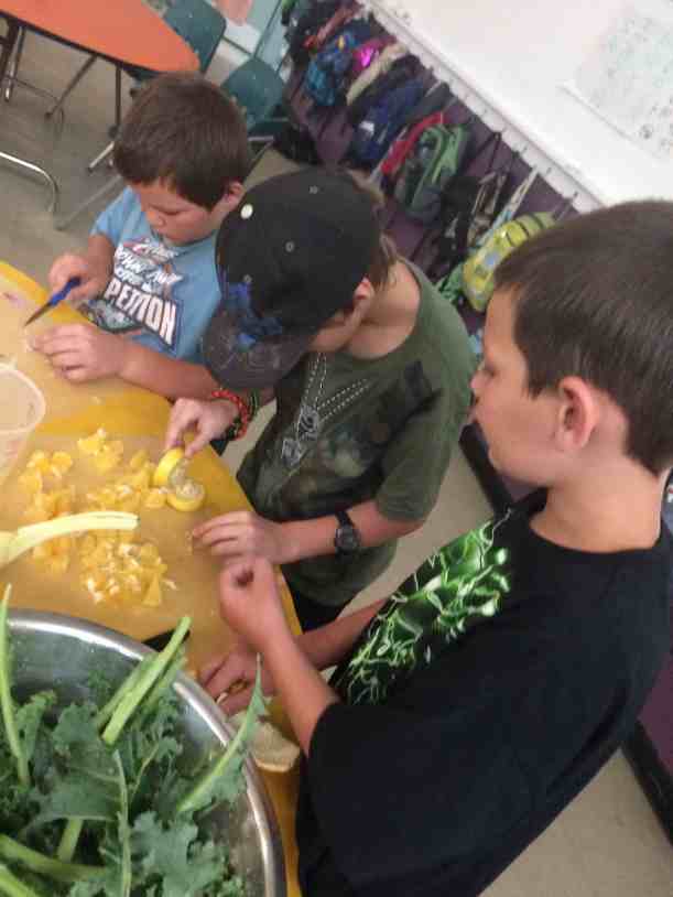 cutting oranges for kale salad