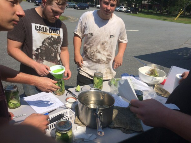 filling and labeling pickle jars 2