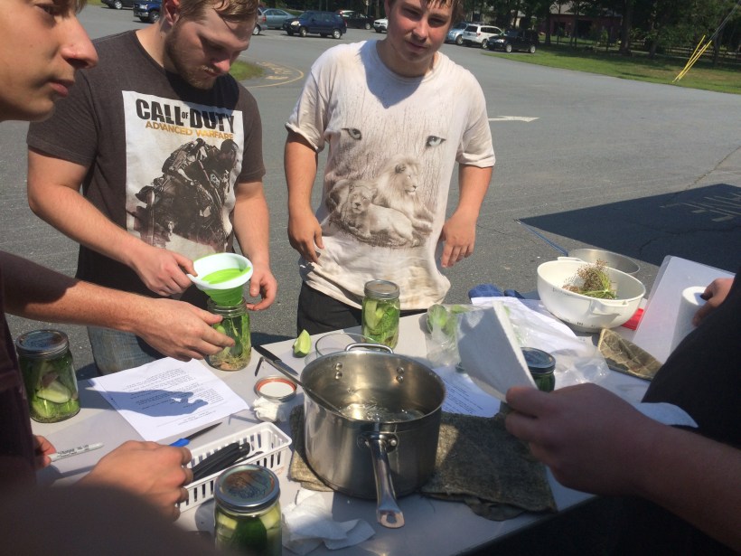 filling and labeling pickle jars 2
