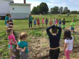 PLANTING SUNFLOWER HOUSE K.jpg